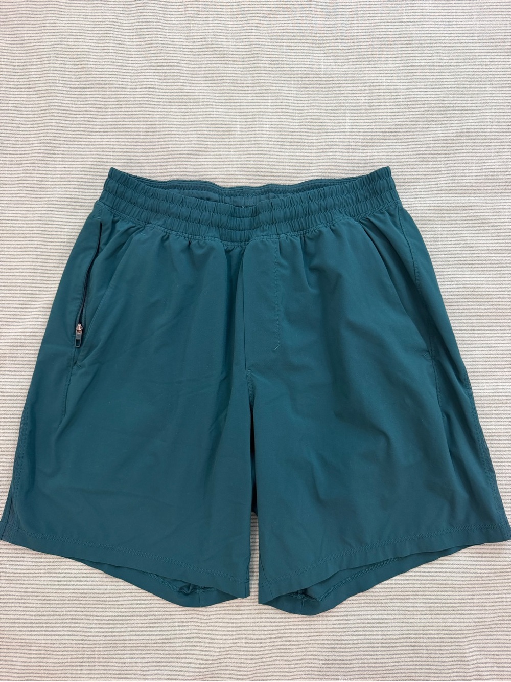 Lululemon pacebreaker shorts- turquoise. Size M- Lined